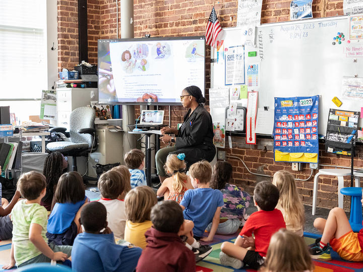 Students and teacher in classroom 